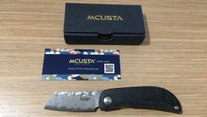 Couteau pliant Mcusta - VG10 Damas - noir/orange - série limitée