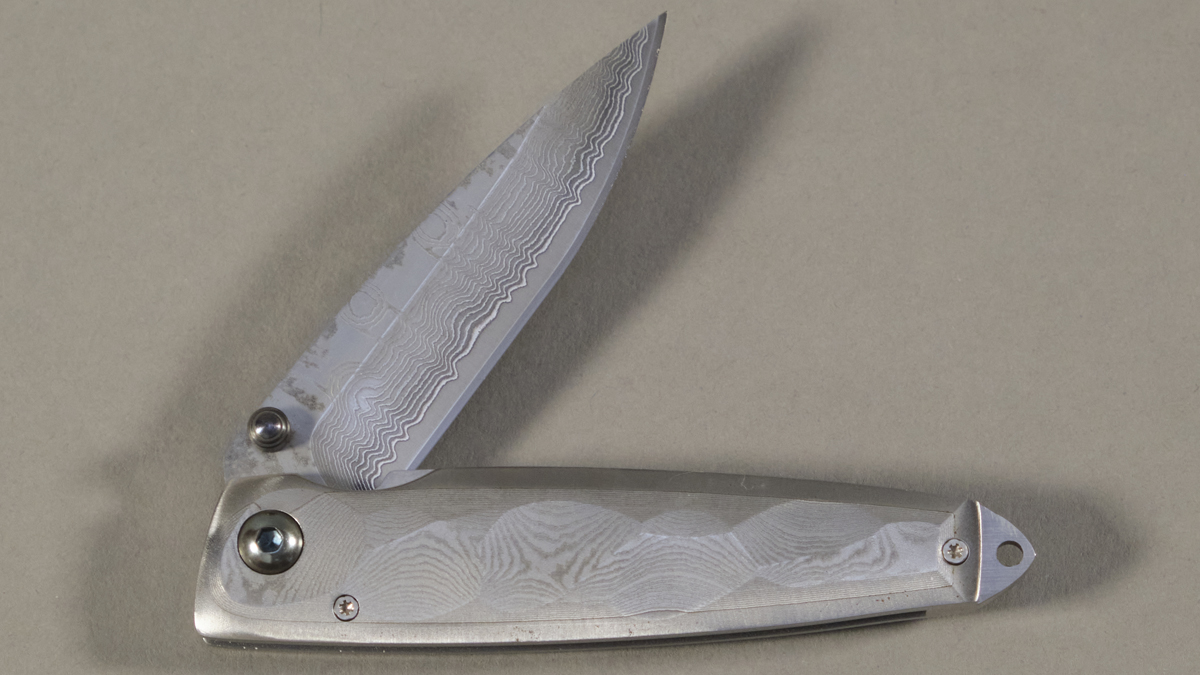 Couteau japonais pliant Mcusta Tsuchi - manche 10 cm acier VG-10 damas inox 66 couches