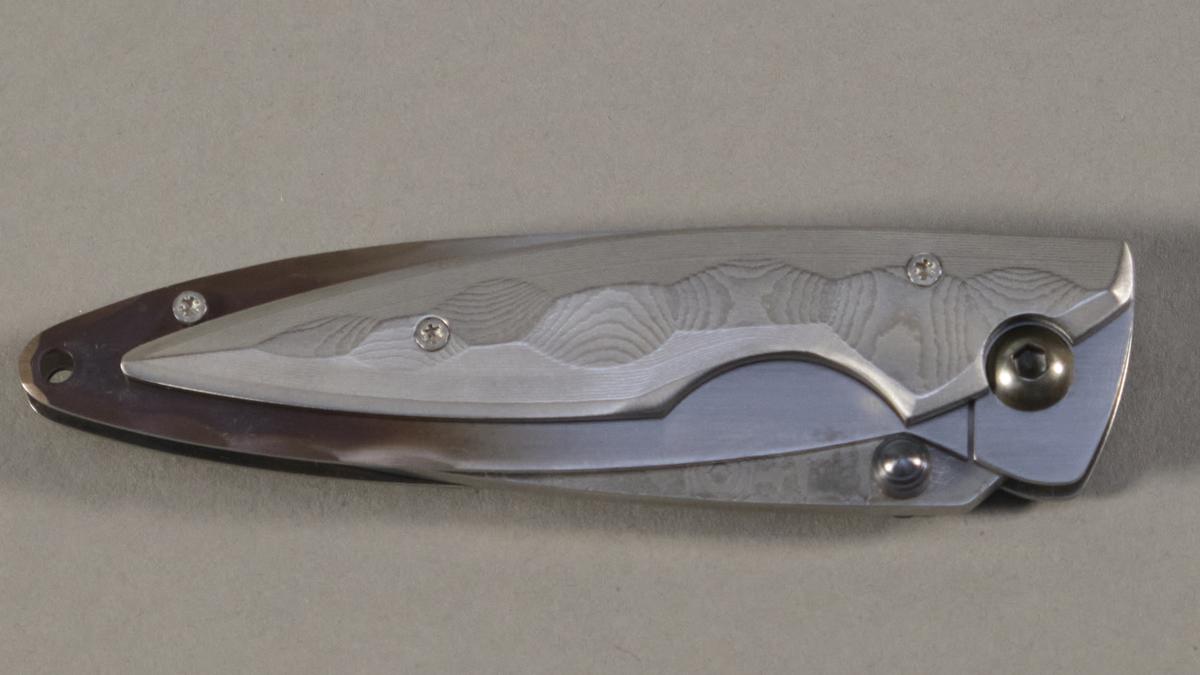 Couteau japonais pliant Mcusta Kasumi - manche 9,5 cm acier VG-10 damas inox 66 couches