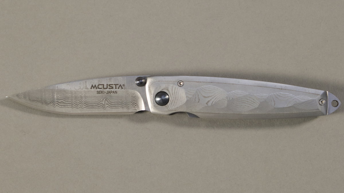 Couteau japonais pliant Mcusta Tsuchi - manche 10 cm acier VG-10 damas inox 66 couches